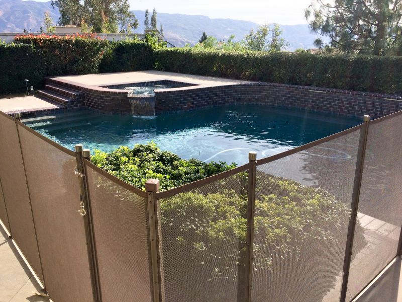 Mesh Pool Fence in a Residential Setting